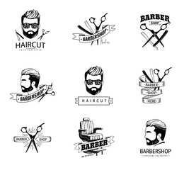 Set of retro barber shop emblems.