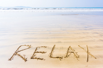 The inscription on the sand relax