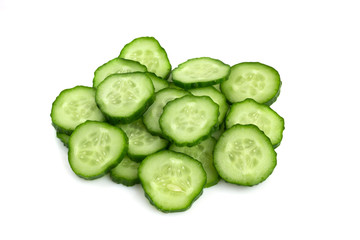 Fresh green cucumbers on a white background. Sliced cucumbers isolated on white background.