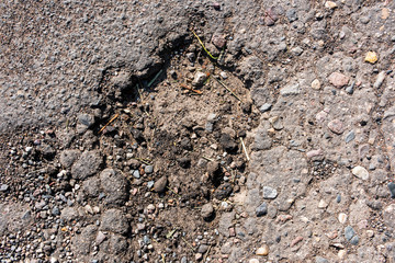 Damaged wear surface asphalt is close