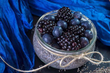 blueberries and chia pudding on the table
