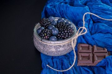 Fototapeta na wymiar blueberries and chia pudding on the table