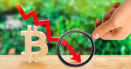 fall in the cost of bitcoin. Concept of a cryptocurrency market crisis. blockchain technology....
