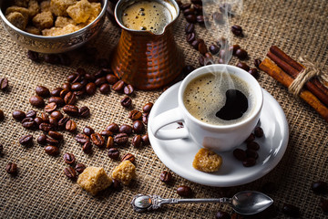 Black coffee on old background