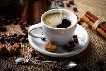 Black coffee on old background