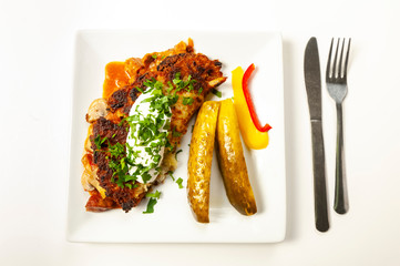 potato pie served with pork stew