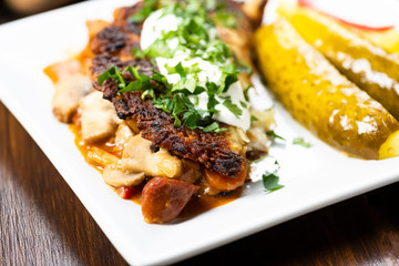 potato pie served with pork stew