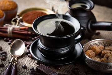 Black coffee on old background