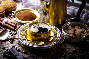 Black coffee on old background