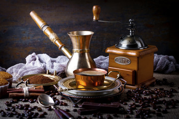 Black coffee on old background