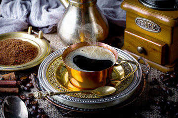 Black coffee on old background