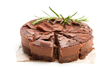 Baked belgian chocolate cheesecake with rosemary topped with chocolate ganache