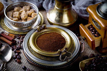 Black coffee in a composition with kitchen accessories