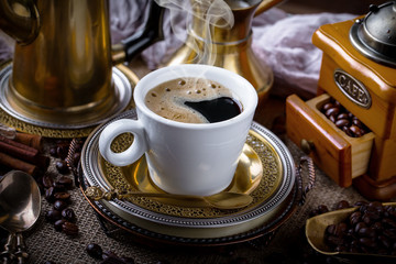 Black coffee on old background