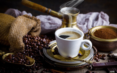 Black coffee on old background