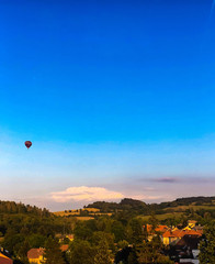 hot air balloon over the countryside