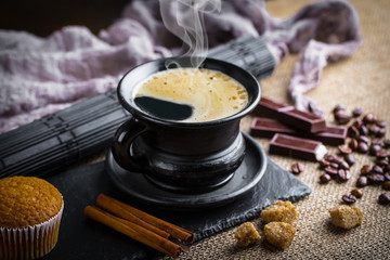 Black coffee on old background