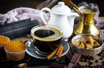 Black coffee on old background