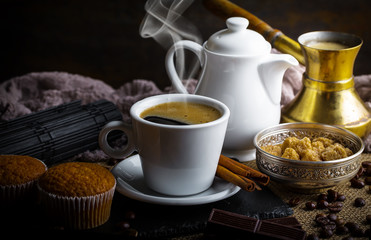 Black coffee on old background