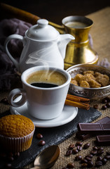 Black coffee on old background