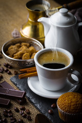 Black coffee on old background
