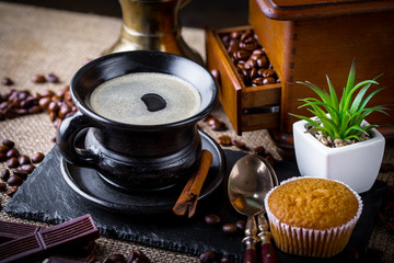 Black coffee on old background