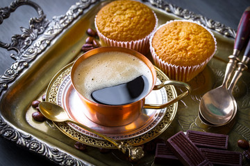 Black coffee on old background