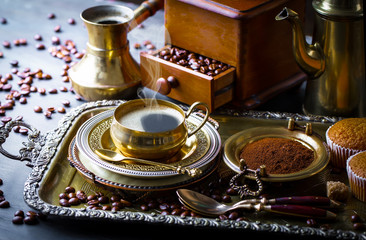 Black coffee on old background