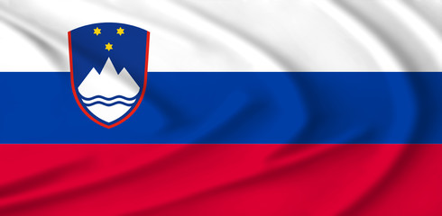 The Slovenial flag waving from the wind, proudly fluttering in the wind