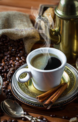 Black coffee on old background