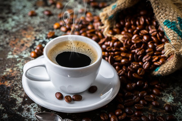 Black coffee on old background