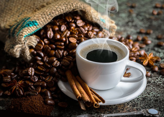 Black coffee on old background