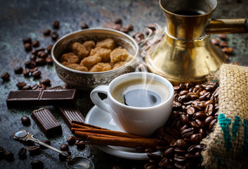 Black coffee on old background