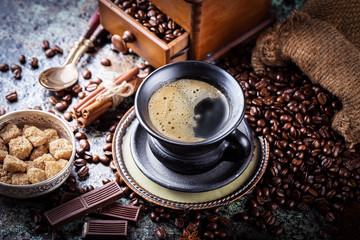 Black coffee on old background