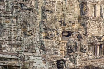 Smiling stone faces of the Bayon temple in Angkor Thom in Cambodia