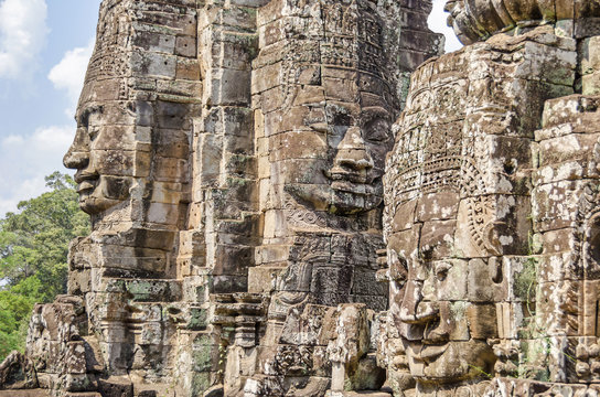 Smiling stone faces of the Bayon temple in Angkor Thom in Cambodia