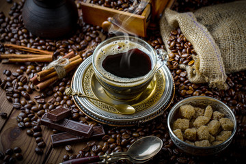 Black coffee on old background