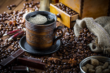 Black coffee on old background