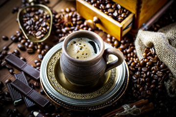 Black coffee on old background