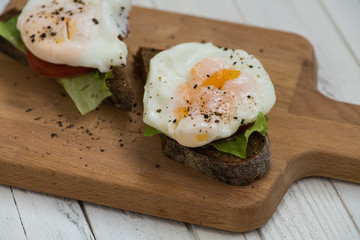 Eggs Benedict (poached eggs with bread)