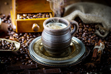 Black coffee on old background