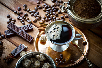 Black coffee on old background