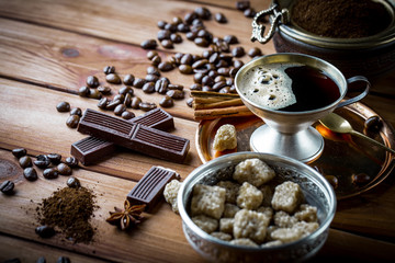 Black coffee on old background