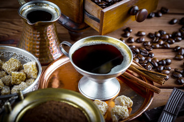 Black coffee on old background