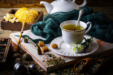 Tea in a cup on an old background