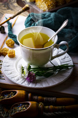 Tea in a cup on an old background