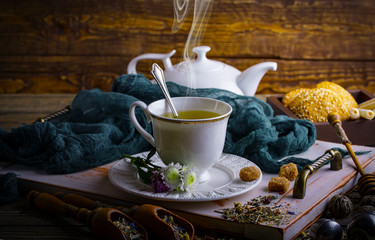 Tea in a cup on an old background