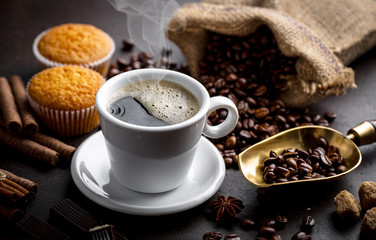 Black coffee on old background