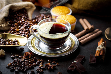 Black coffee on old background