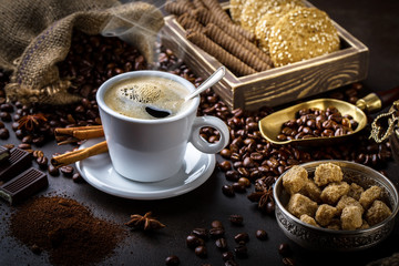 Black coffee on old background